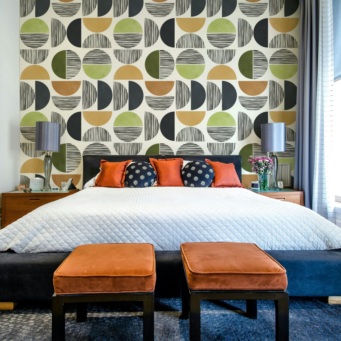 The room feels warm and serene due to the elegant design.

