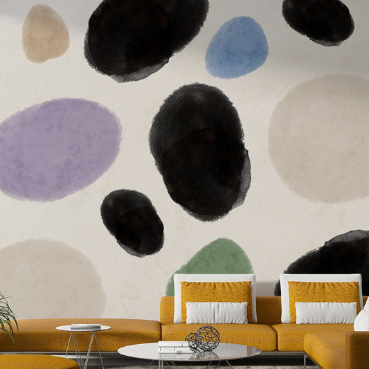 Abstract Watercolor Dots wallpaper mural in black, lilac and blue behind a mustard yellow sectional sofa in a living room
