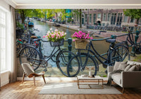 Bicycling culture wallpaper tulip adorned vintage black city bikes.