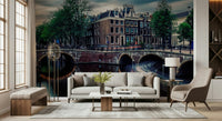 Amsterdam Canal Dreams wallpaper mural of the canal at dusk behind a cream sofa and globe floor lamp in a living room