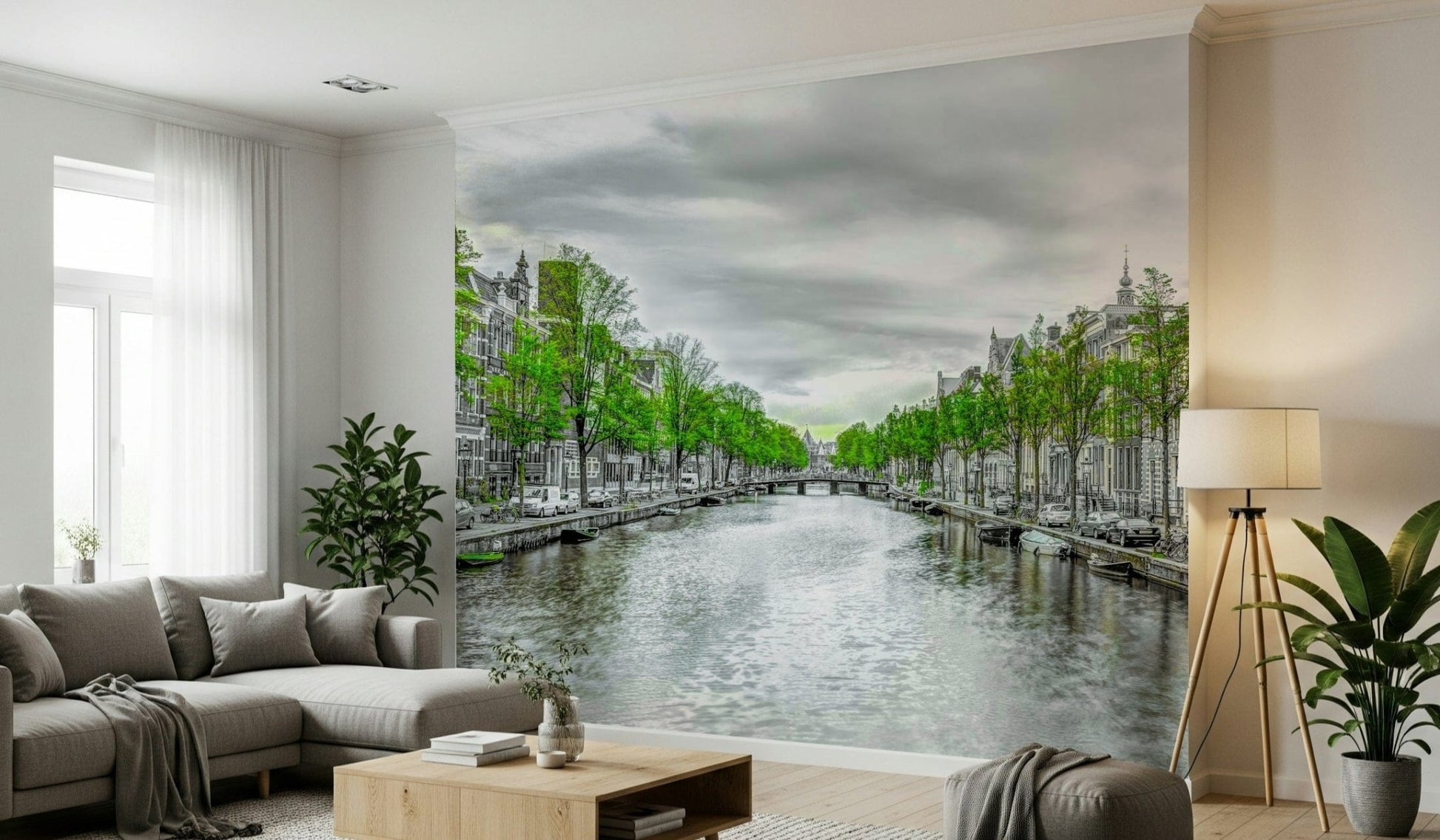 Amsterdam Canal Serenity wallpaper mural of a canal with moored boats behind a gray sectional sofa in a living room