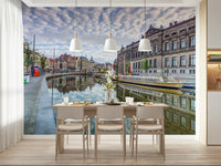 Amsterdam canal scene watercolor mural in reading nook, soft blue-grey styling