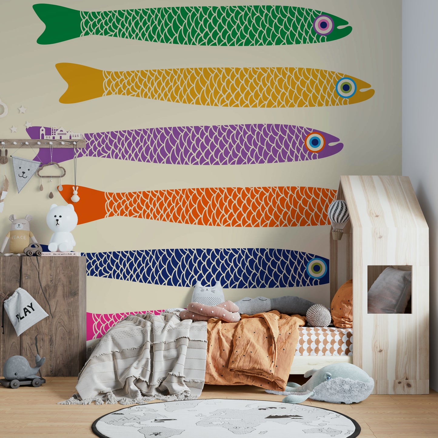 Tropical fish design with rainbow hues on a cream wall mural.

