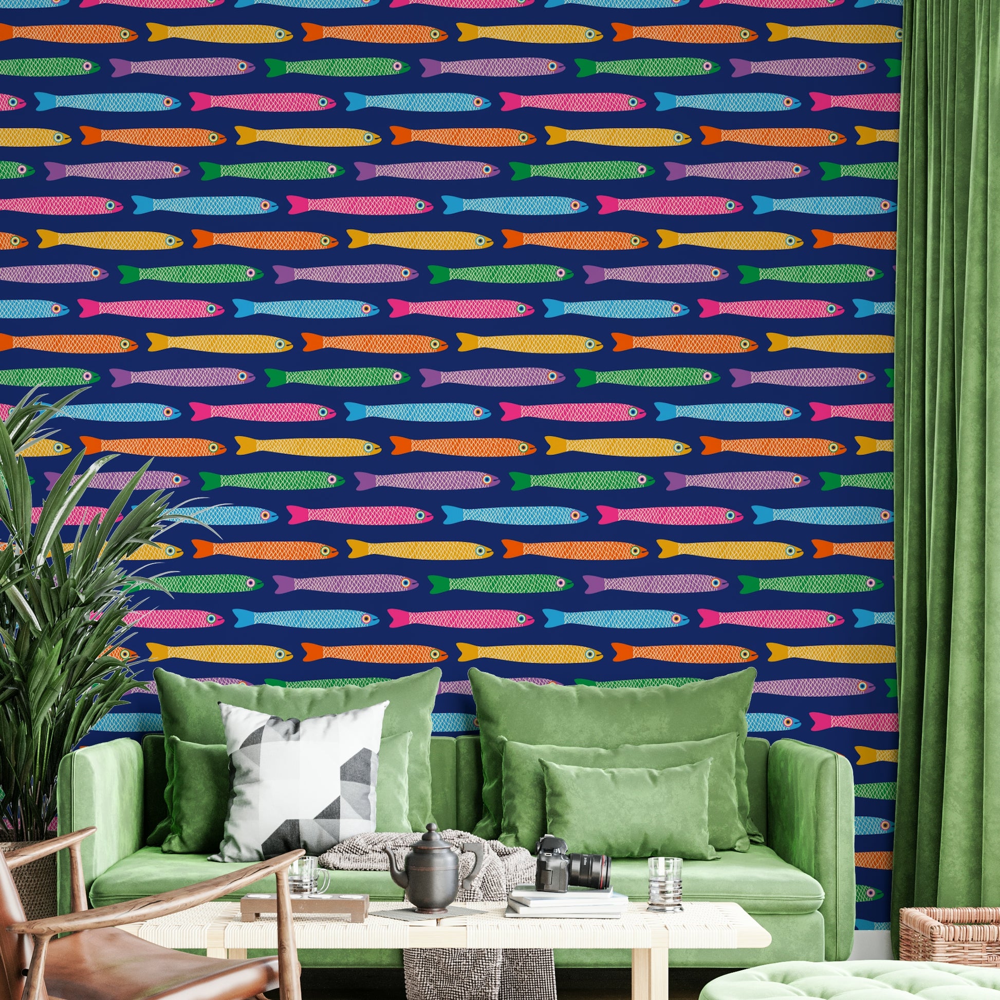 Underwater-themed wallpaper with rainbow-colored anchovies on blue.

