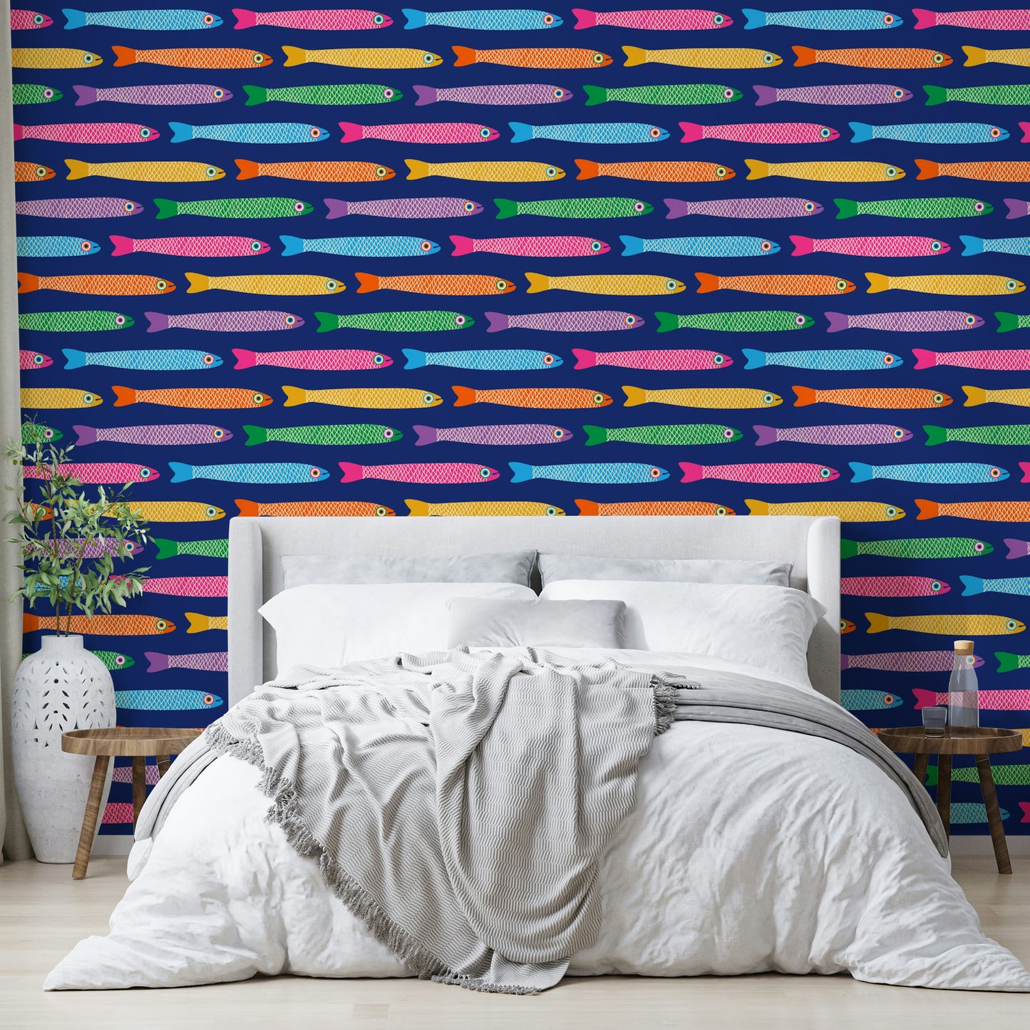 Brightly colored fish design on royal blue wallpaper.

