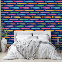 Brightly colored fish design on royal blue wallpaper.

