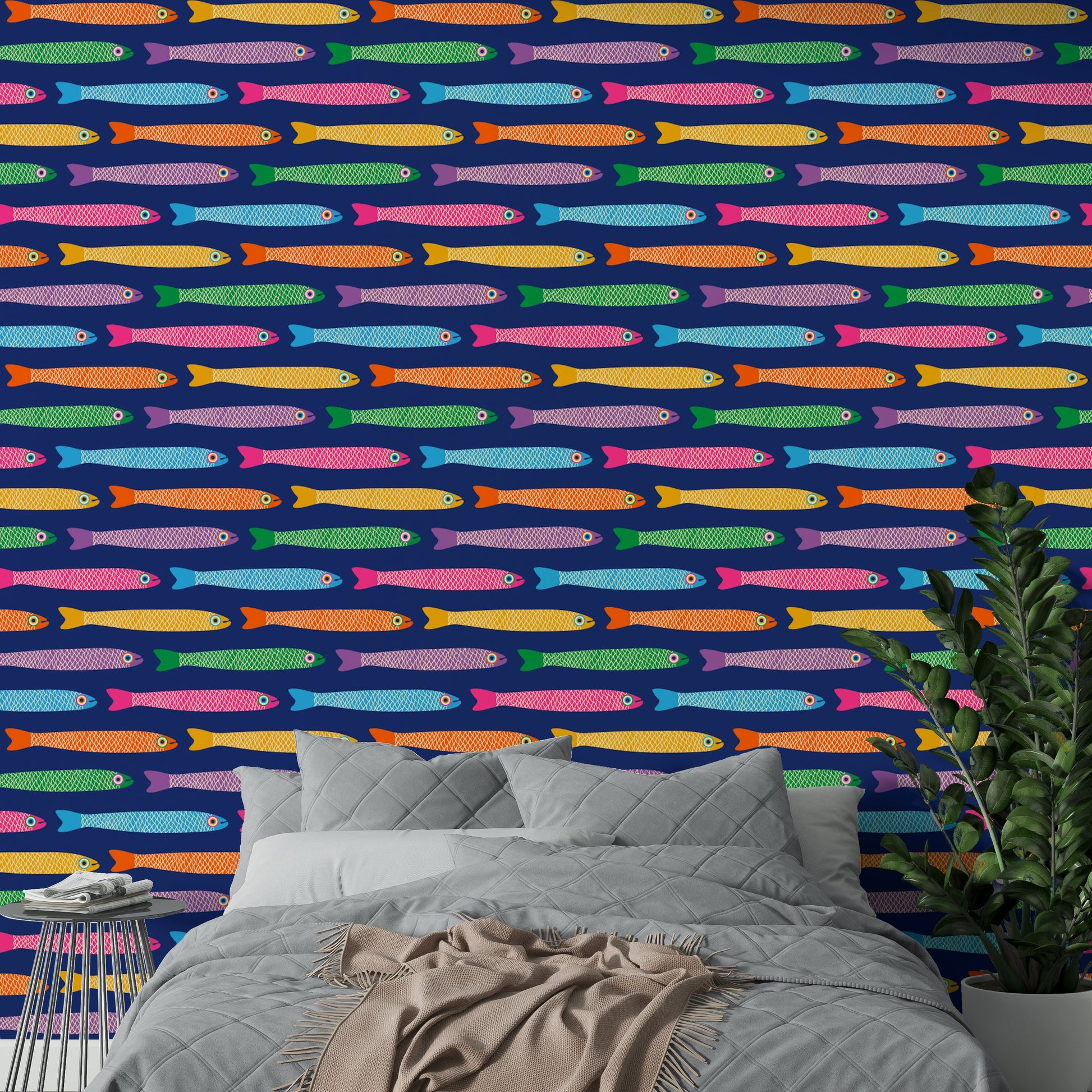 Underwater-inspired wallpaper with lively rainbow fish on a rich blue surface.

