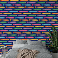 Underwater-inspired wallpaper with lively rainbow fish on a rich blue surface.

