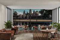 A beautiful Angkor Wat wallpaper mural reflecting in water.

