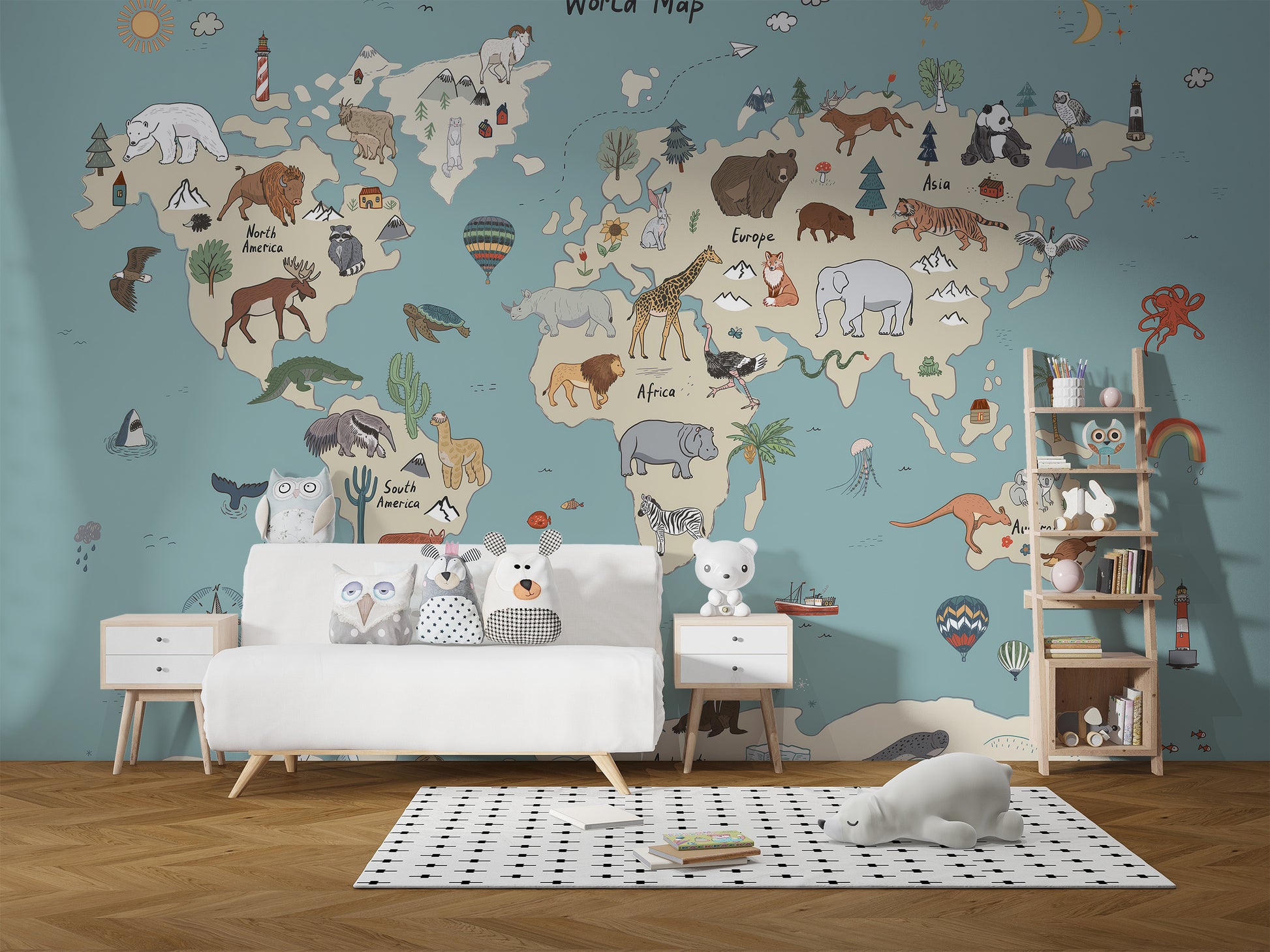Animal Adventure Atlas wallpaper mural behind a white sofa with owl plush toys and a wooden ladder shelf in a kids room