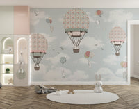 Animated Animals Sky wallpaper mural as a feature wall in a home office workspace in pink tones