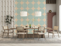 Neutral-toned wallpaper with oversized aqua round shapes arranged neatly in rows and columns