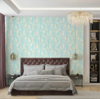 A peaceful tropical jungle mural on decorative wallpaper.

