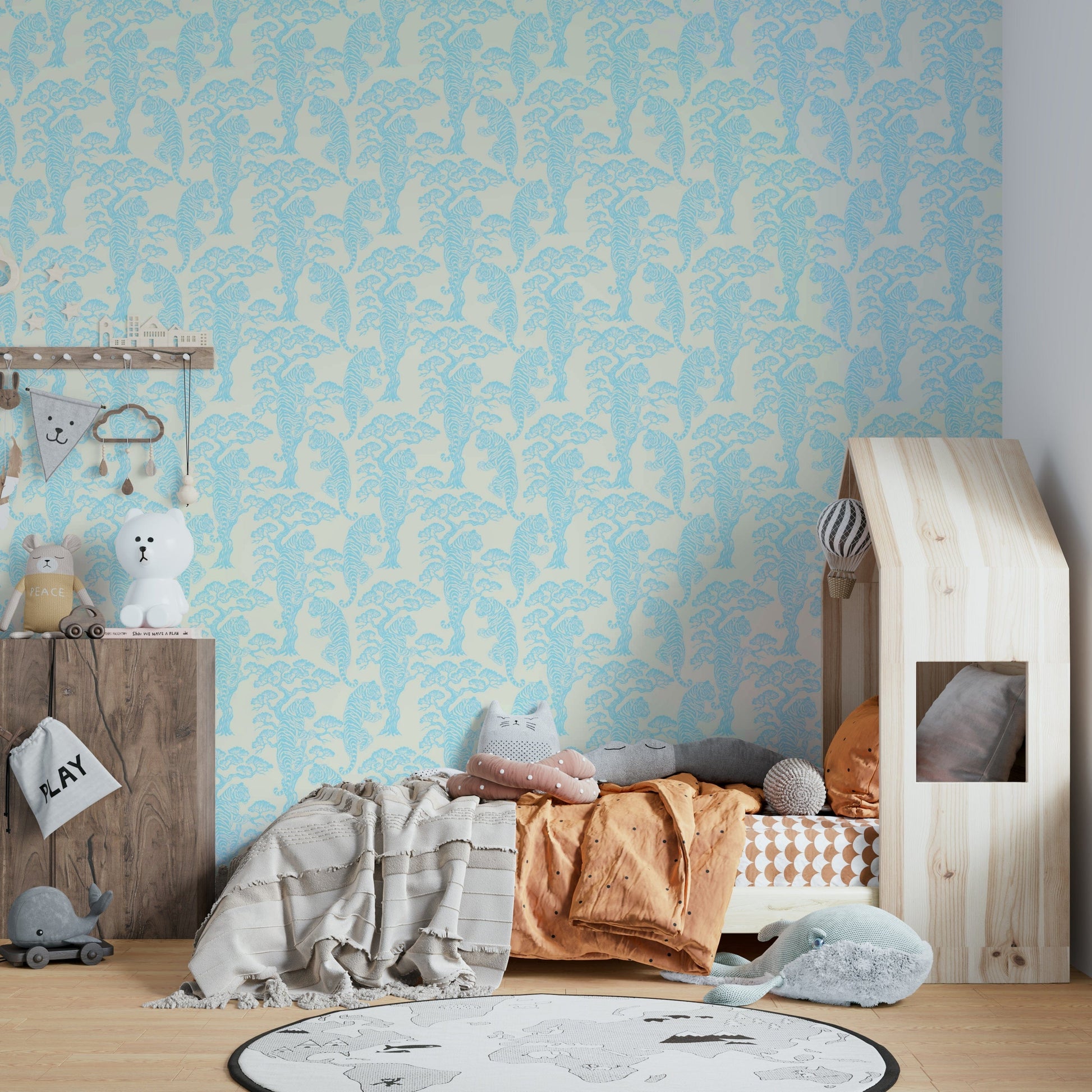 An artistic aqua tiger mural on luxury wallpaper.

