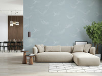 Soft blue whale mural for a peaceful home office setting.