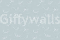 Coastal style whale wall decor for an apartment hallway.