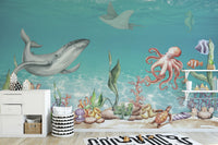Aquatic Harmony wallpaper mural with whale, octopus and seahorse in turquoise water in a kids room with a white dresser