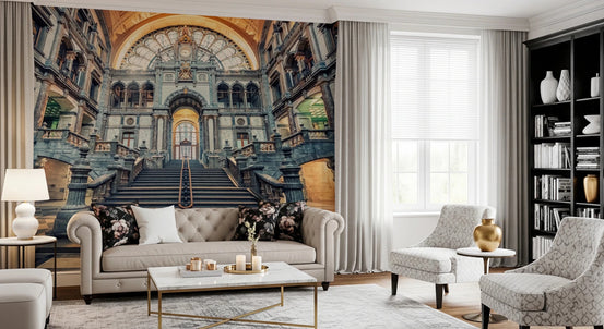Architectural Majesty mural of a grand stone staircase hall behind a beige tufted Chesterfield sofa