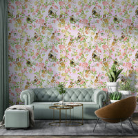 Illustrated monkey wall mural with soft pink and botanical elements.

