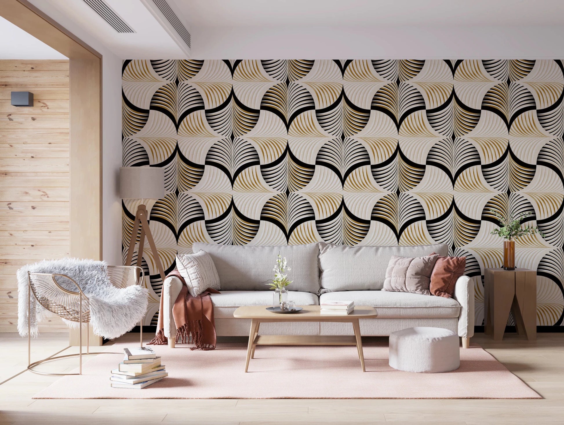 Art Deco Botanical Palm Fan Gold and Black wallpaper behind a grey sofa and rattan chair with a pink rug