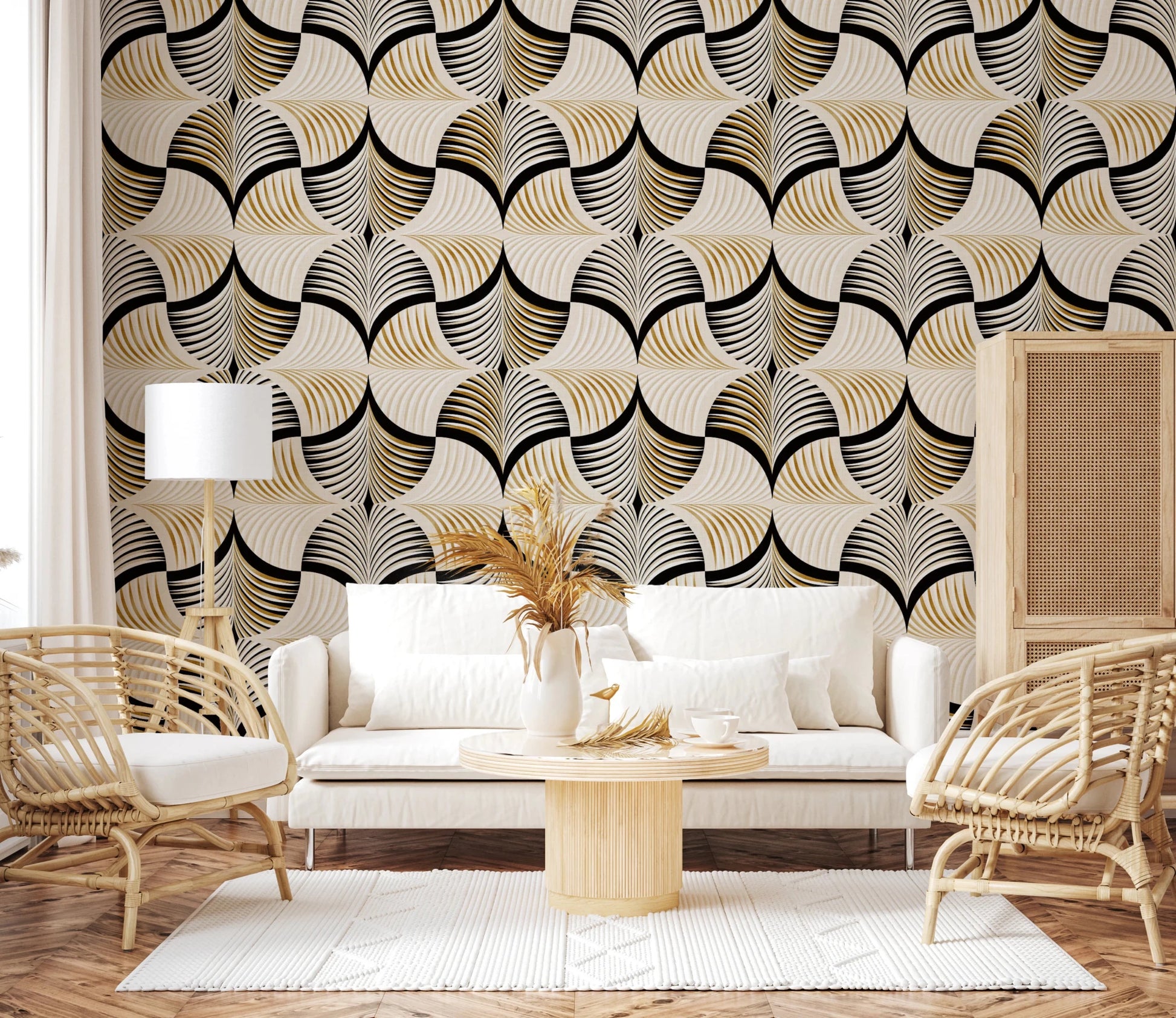 Art Deco Botanical Palm Fan Gold and Black wallpaper behind a white sofa and rattan chairs in a living room