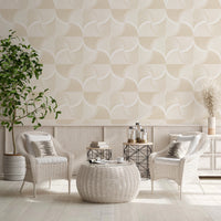 Art Deco Botanical Palm Fan Soft White Beige wallpaper behind white wicker chairs and a woven pouf table