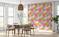 Art Nouveau Botanica Fan Flow Bloom Burst wallpaper behind a round wood dining table and beige chairs
