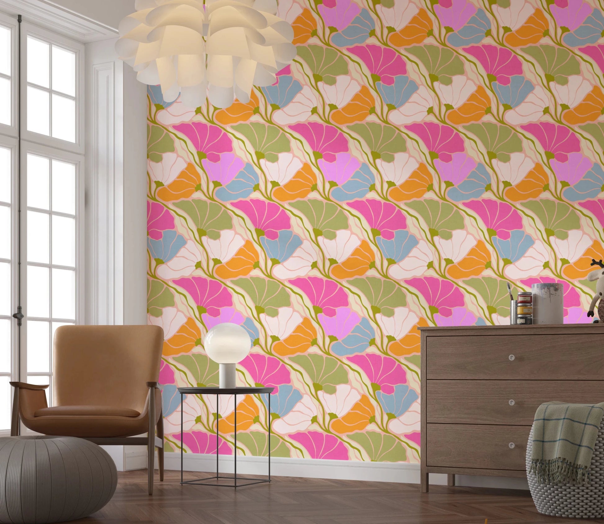 Art Nouveau Botanica Fan Flow Bloom Burst wallpaper behind a tan leather chair and wood dresser in a bedroom