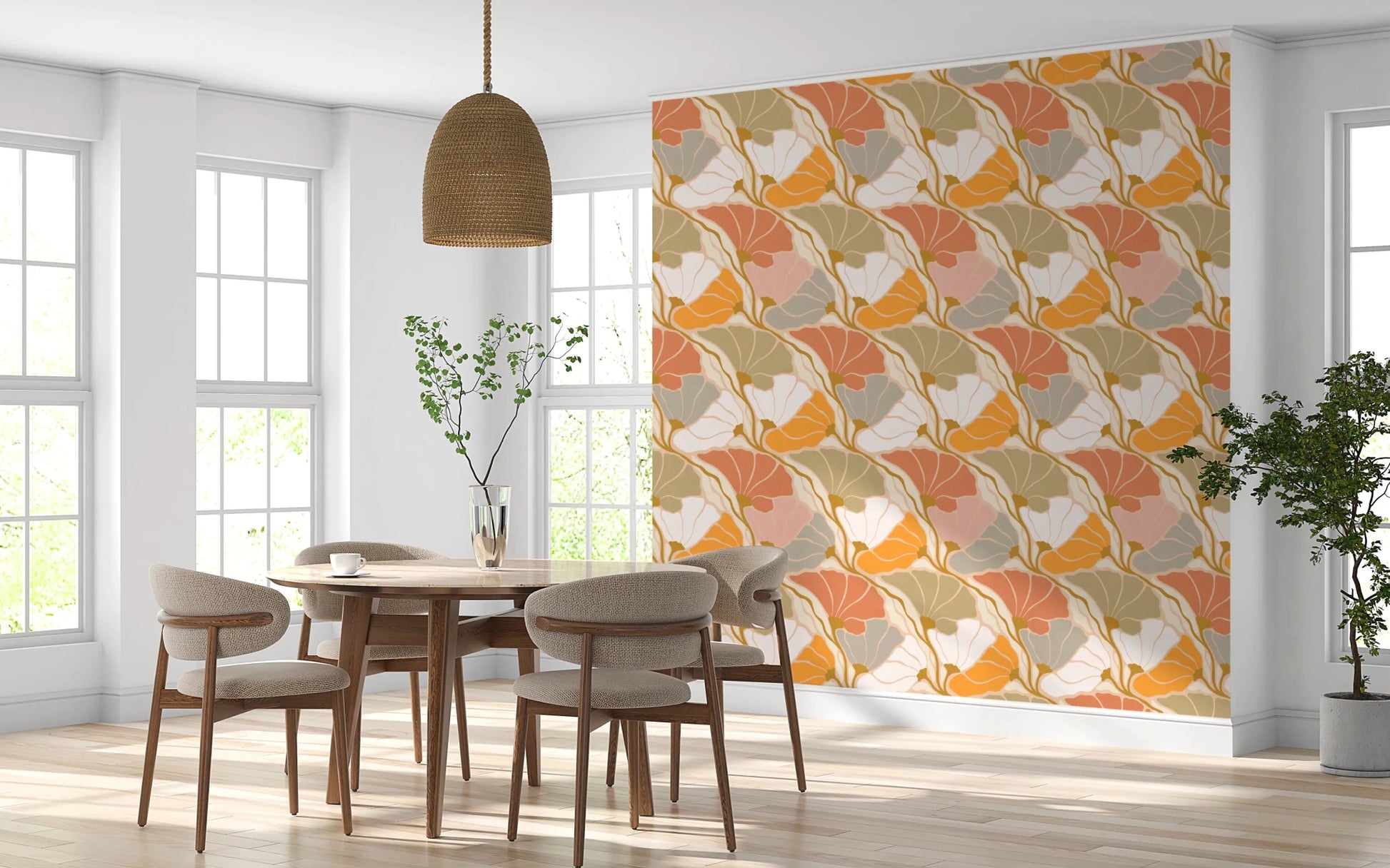 Art Nouveau Botanica Fan Flow Cosy Blooms wallpaper behind a round wood dining table and beige chairs