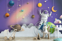 Astronaut in Space on Mission wallpaper mural styled along a hallway feature wall near a console in purple tones