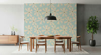 Atomic petals wallpaper featuring cream starburst flowers on a soft aqua blue background.