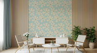 Mid-century inspired wallpaper with geometric pinwheel blooms in cream over a pastel blue backdrop.