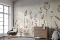 Autumn Flowers wallpaper mural of dried botanicals behind a grey armchair and wood dresser in a nursery