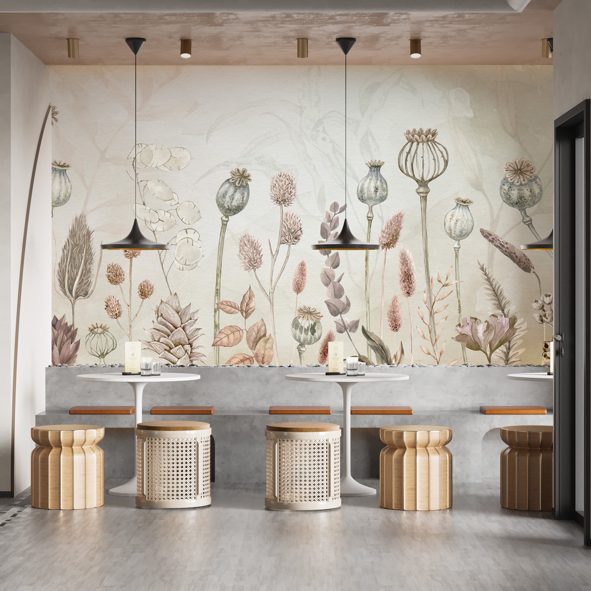 Autumn Flowers wallpaper mural of dried poppy pods behind concrete bench seating and rattan stools in a cafe