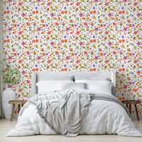 Forest leaf and flower wallpaper in warm tones

