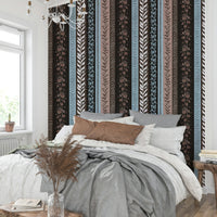 Wallpaper with leaf and floral designs.

