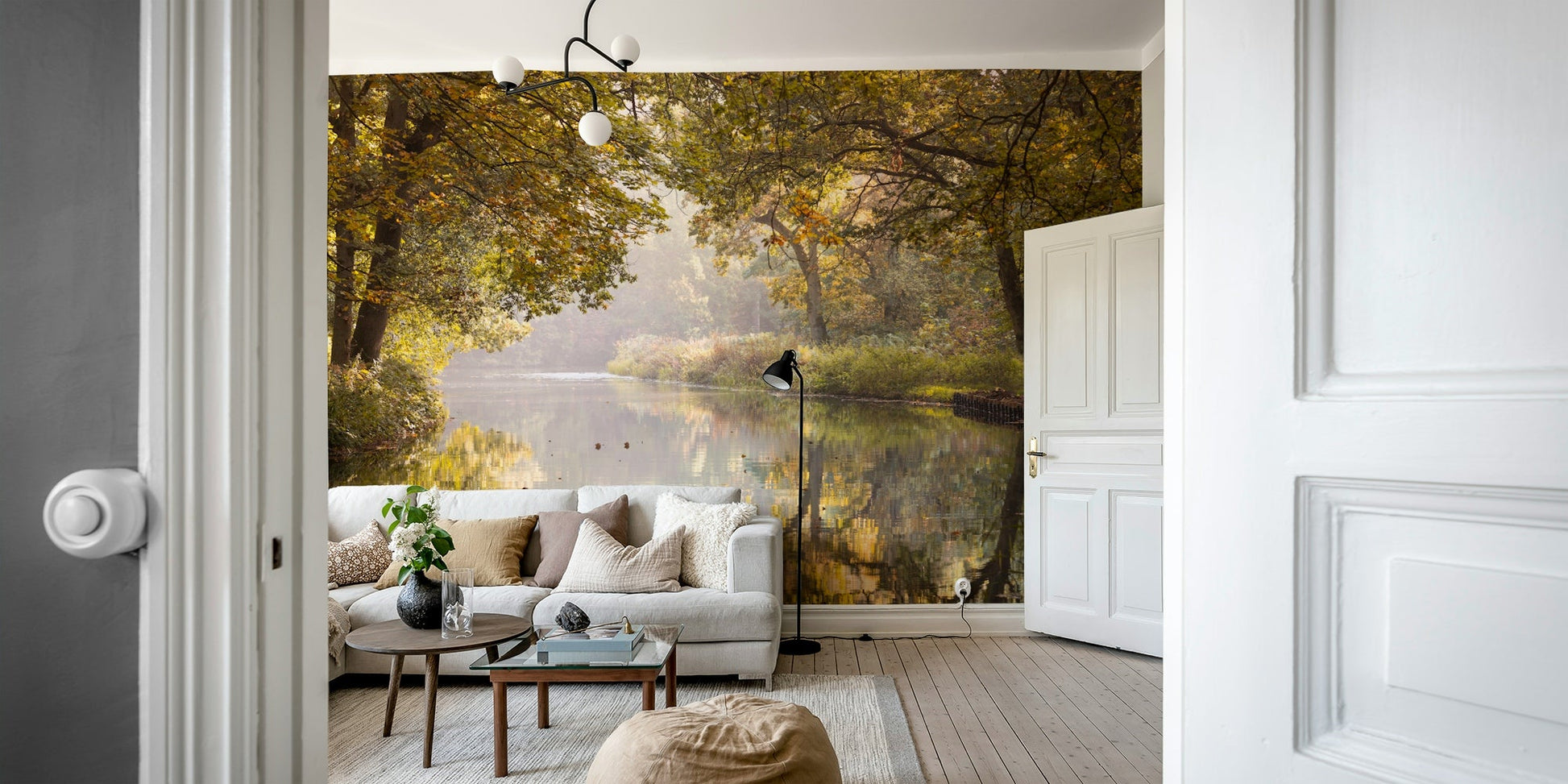 The room's lighting highlights the serene, quiet feel of the mural.

