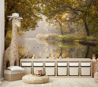 A wall mural featuring a serene autumn water scene.

