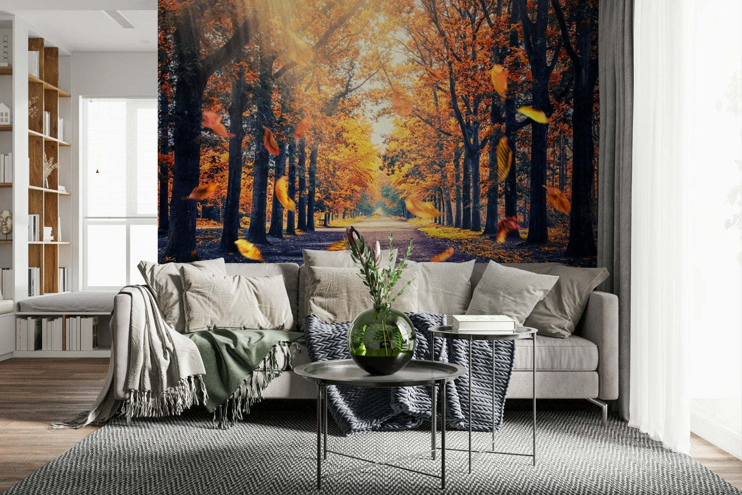 Autumn forest wallpaper showing a golden tree-lined path with fallen leaves