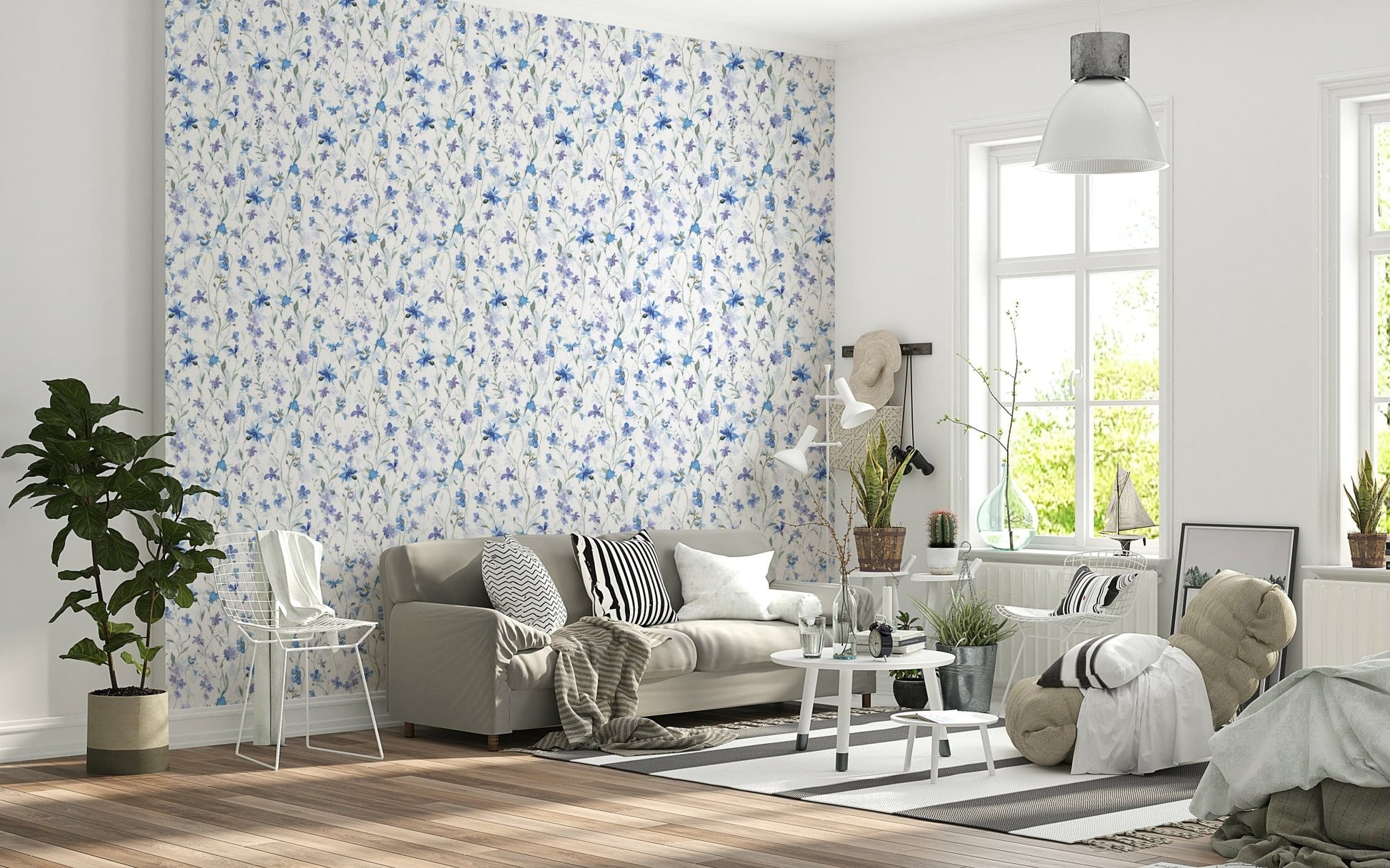 Soft blue botanical wallpaper in an apartment bedroom with neutral bedding.
