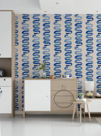Elegant blue swirl wallpaper adding a serene, airy ambiance.