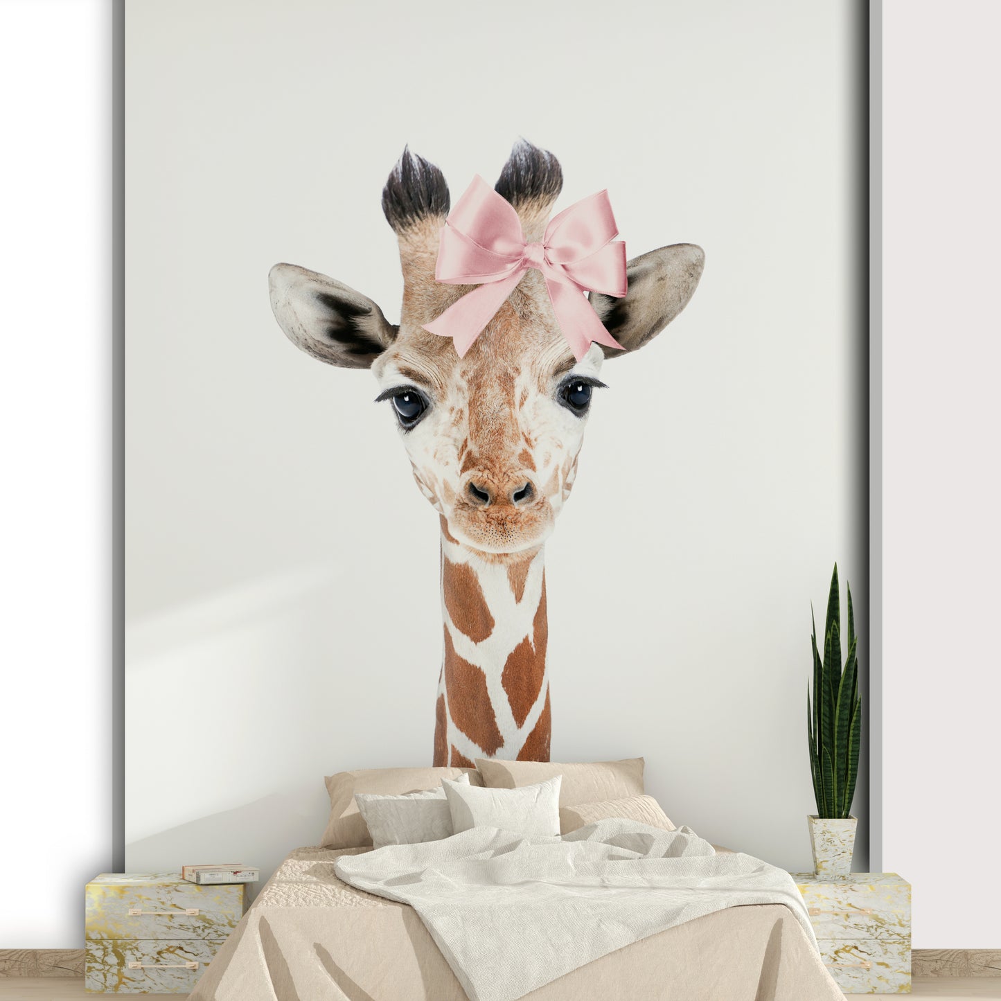 Baby giraffe with polka dot bow wallpaper for girls' rooms.