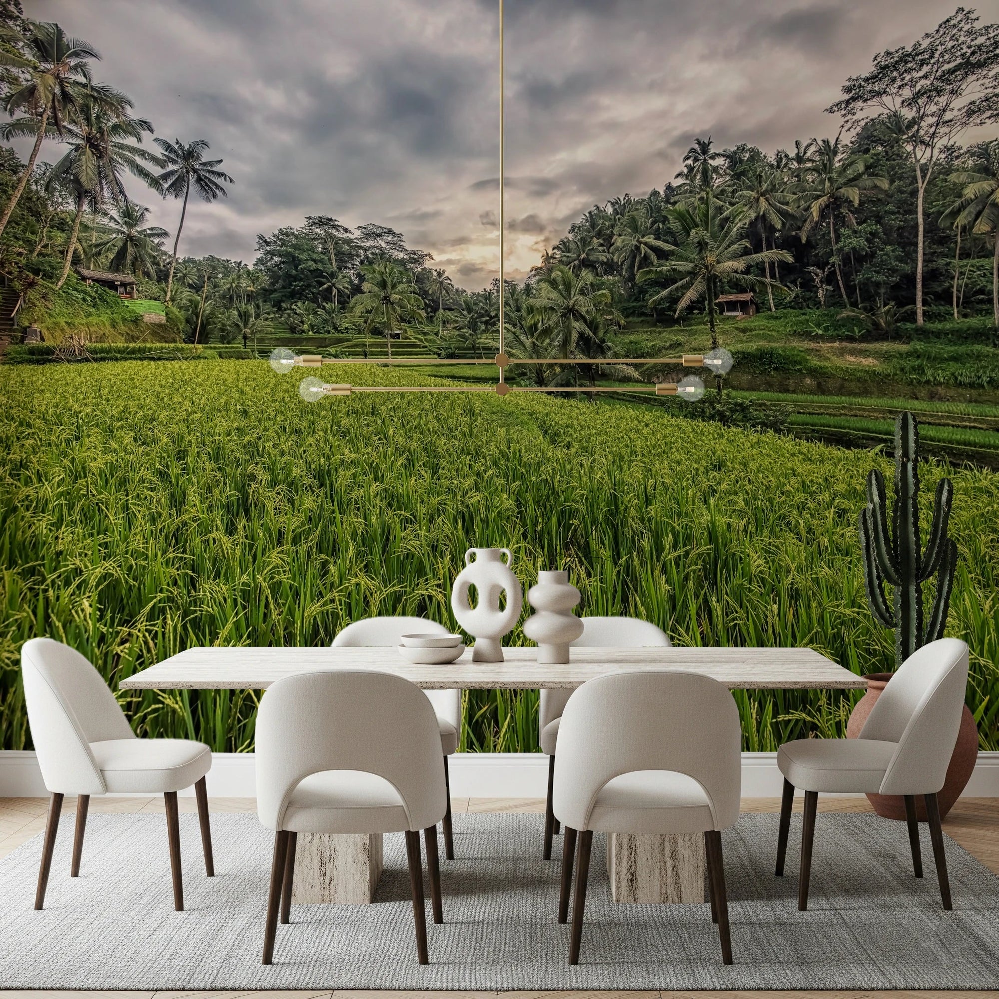 Bali Harvest wall mural of green rice terraces and palms behind a white dining table and cream chairs