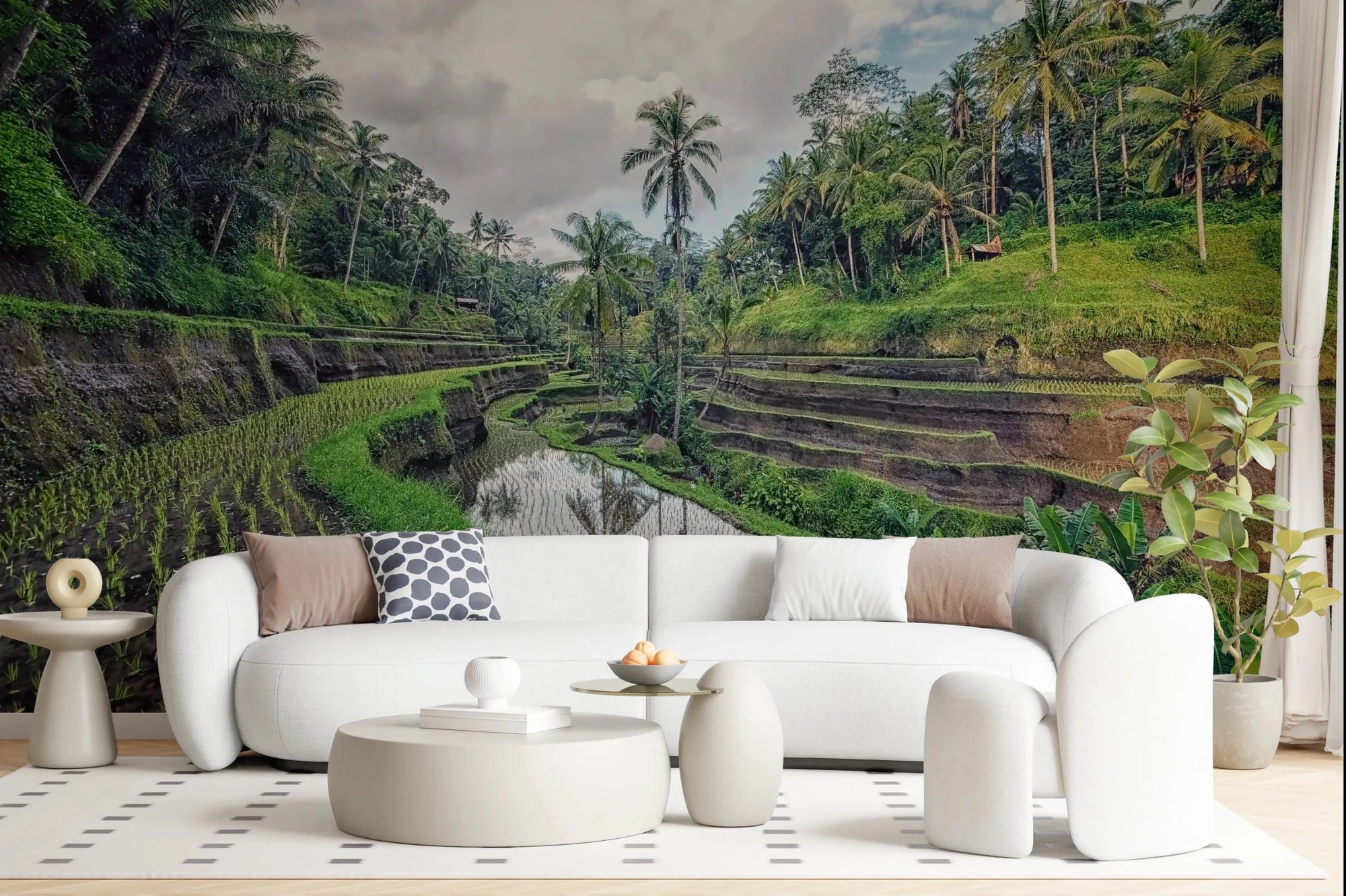 Bali Rice Fields wallpaper mural of green terraced paddies and palms behind a white curved sofa