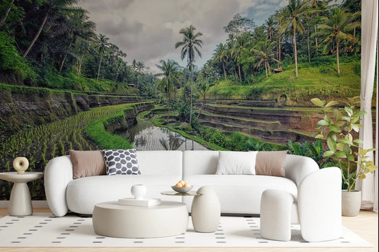 Bali Rice Fields wallpaper mural of green terraced paddies and palms behind a white curved sofa