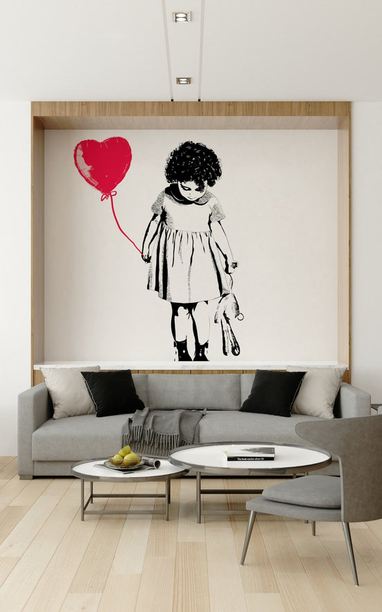 Balloon Girl Art wallpaper mural with a girl and red heart balloon set in an alcove above a grey sofa