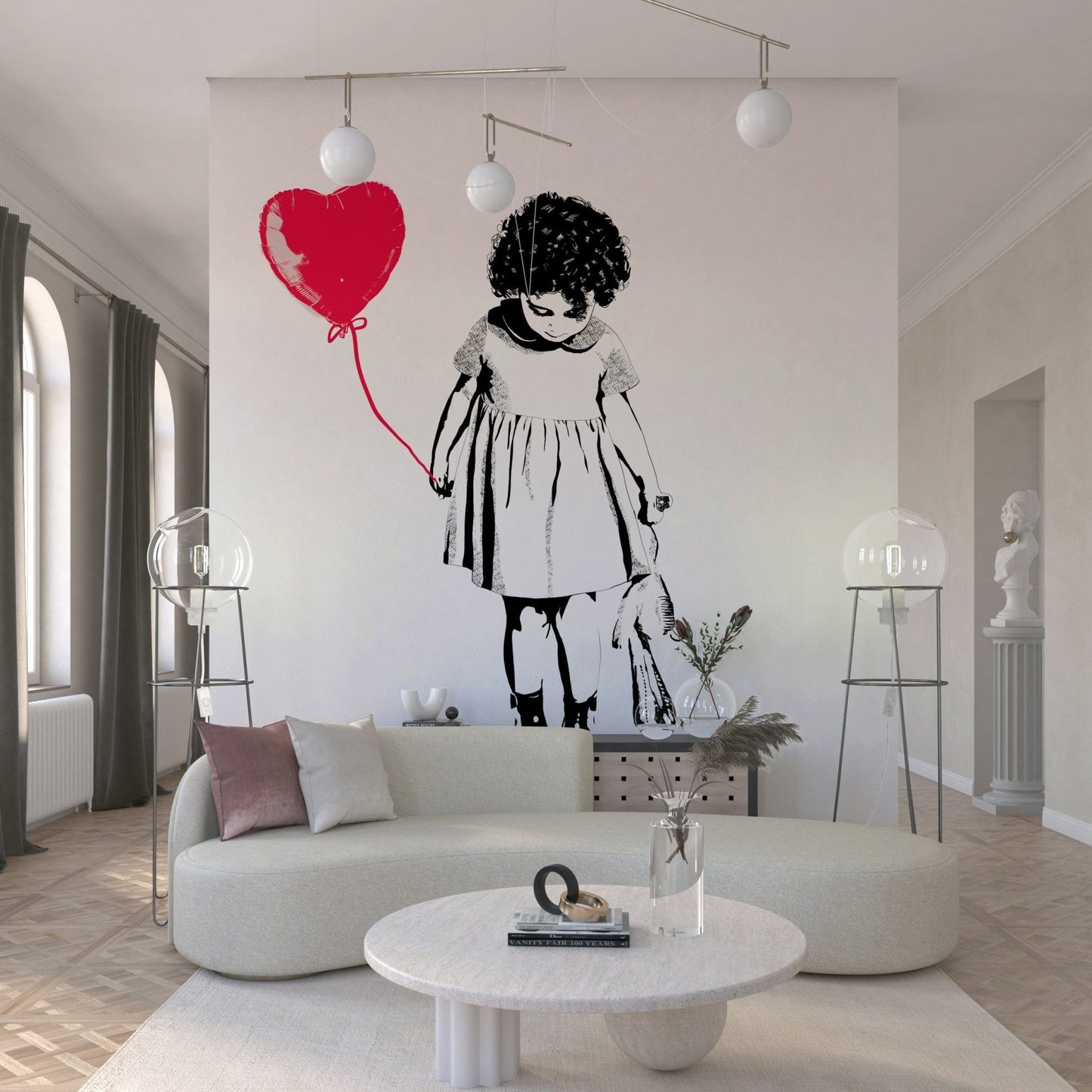 Balloon Girl Art wallpaper mural of a girl and red heart balloon behind a curved cream sofa and globe lamps