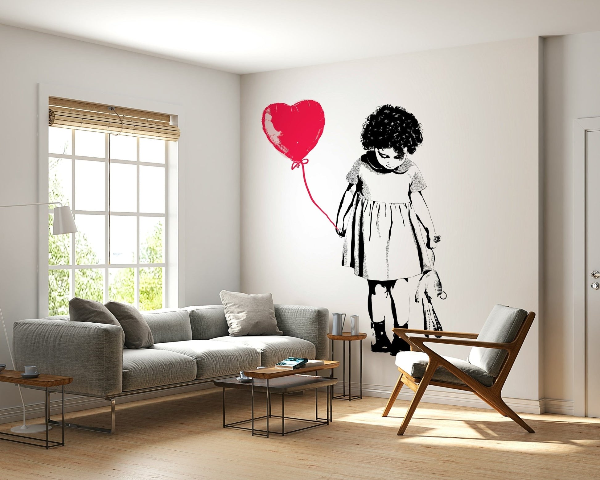 Balloon Girl Art wallpaper mural of a girl and red heart balloon behind a grey sofa and wood-frame armchair