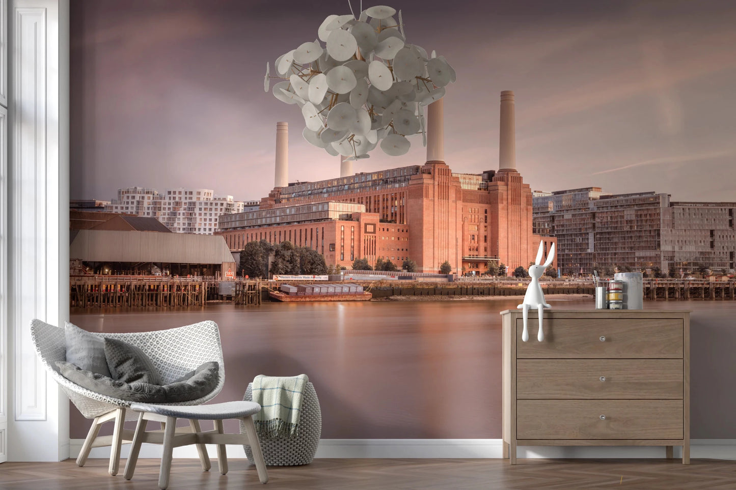 Calm water reflection next to the hallway Battersea Power Station wall mural.