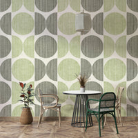 An artistic minimalist pattern mural on geometric wallpaper.

